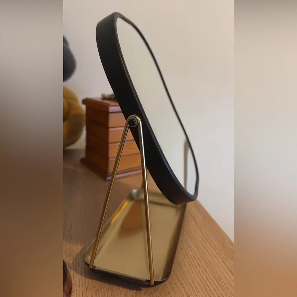 Elegant Black and Gold Vanity Mirror